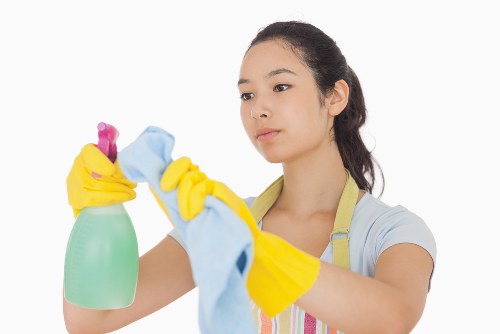 Carpet cleaning technician preparing equipment before a scheduled service