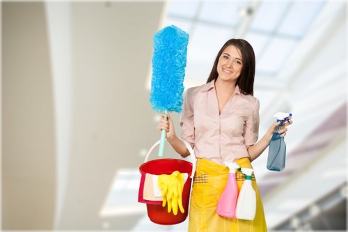 Cleaner treating stains during sofa cleaning in Waddon