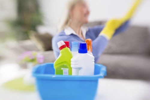 Charity donation boxes with reusable cleaning supplies and textiles
